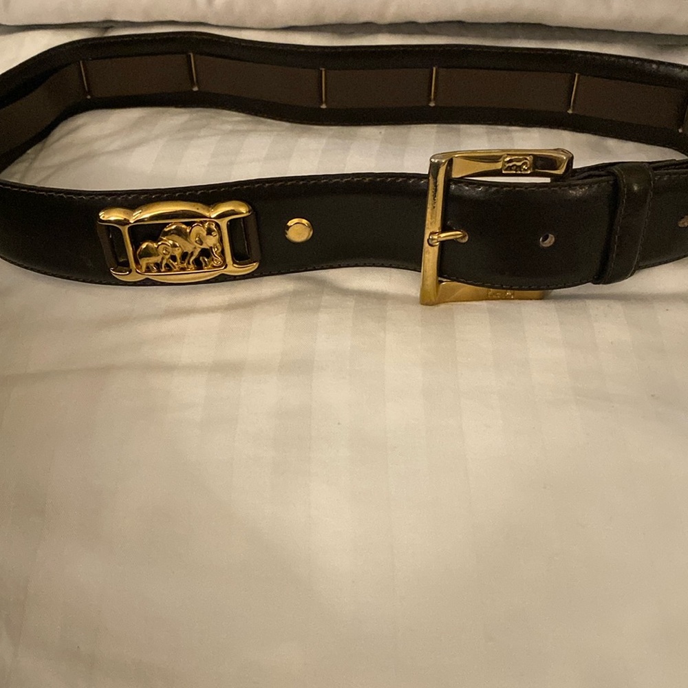 ST.John vintage leather belt 35 inches long it has elephants around it